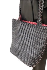 Reversable woven bag in artificial leather
