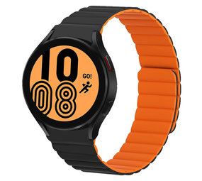 Strap-it® Samsung Galaxy Watch 4 44mm magnetisch siliconen bandje (zwart/oranje) Strap-it® Samsung Galaxy Watch 4 44mm magnetisch siliconen bandje (zwart/oranje)
