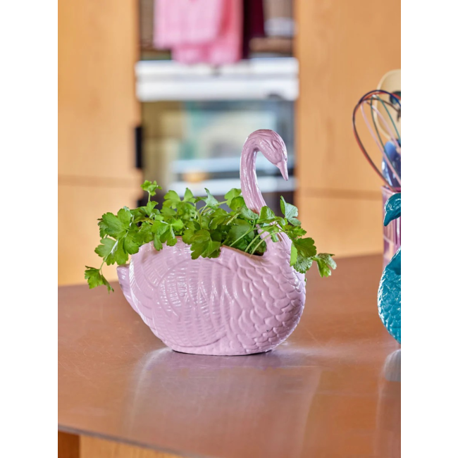 Metal flowerpot in swan shape