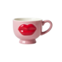 Ceramic mug with embossed red lips