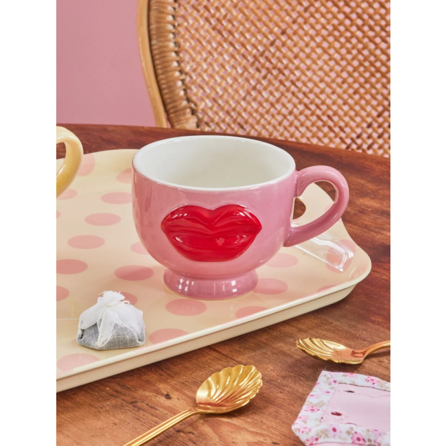 Ceramic mug with embossed red lips