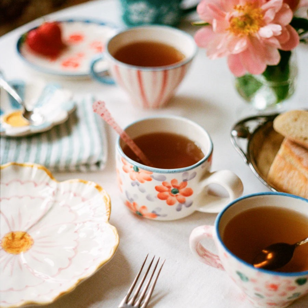 Rice Ceramic cappuccino cup with hand painted flowers orange