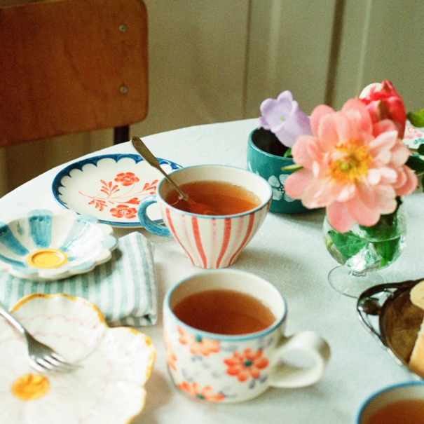 Rice Ceramic tea cup with hand painted stripes