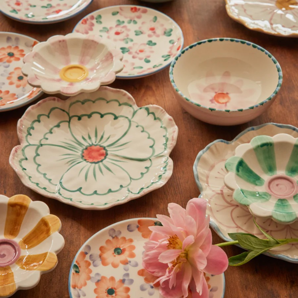 Rice Ceramic flower shaped side plate with pink border