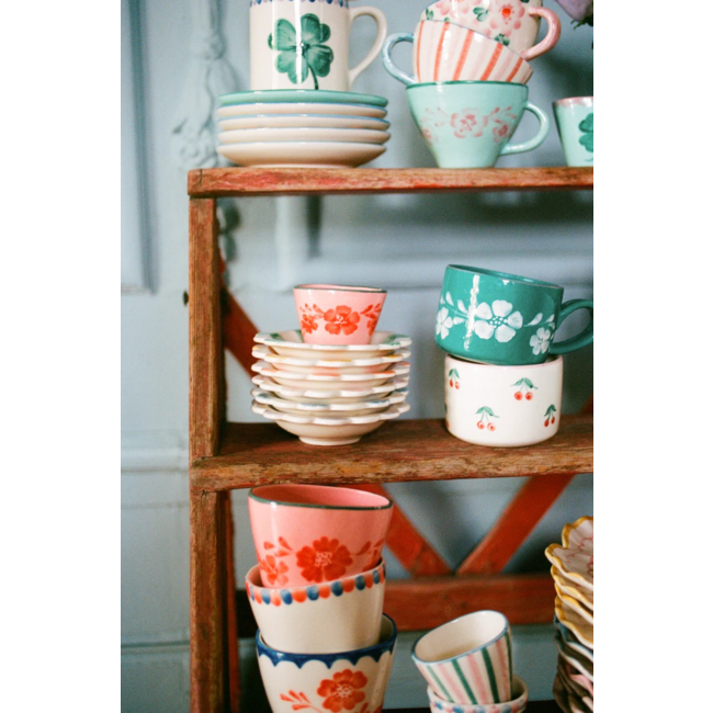 Ceramic oval cup with hand painted orange flower vine