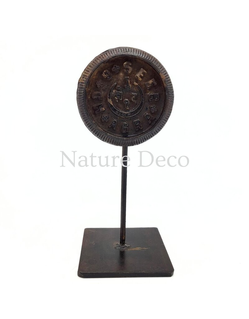 . Iron coin on stand, 10 x 10 x 23 cm