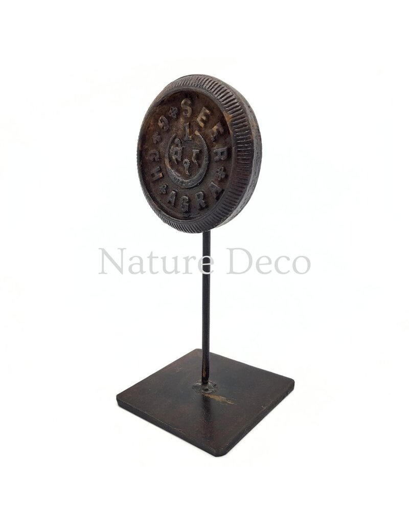 . Iron coin on stand, 10 x 10 x 23 cm