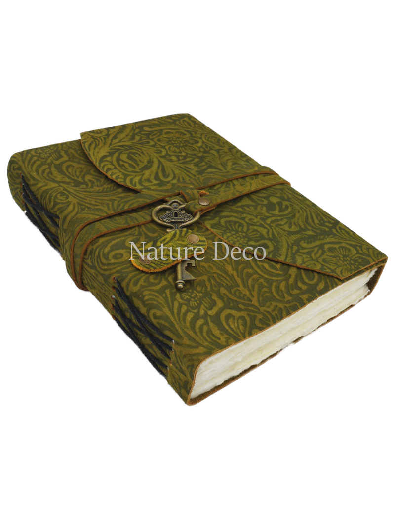 . Green leather notebook with a key