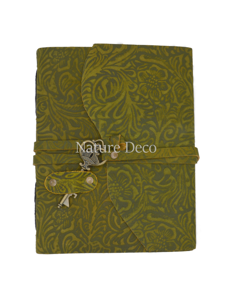 . Green leather notebook with a key