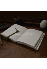 . Green leather notebook with a key