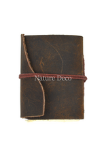 . Small brown leather notebook