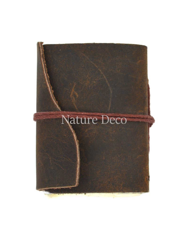 . Small brown leather notebook