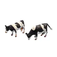 Kids Globe Kühe schwarz/weiß stehend 1:32 (2 Stück)