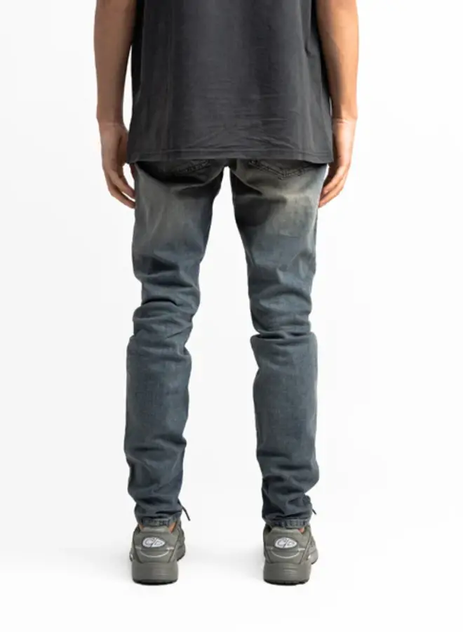 Destroyed repaired jeans sand
