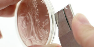 How to Open a Coin Capsule