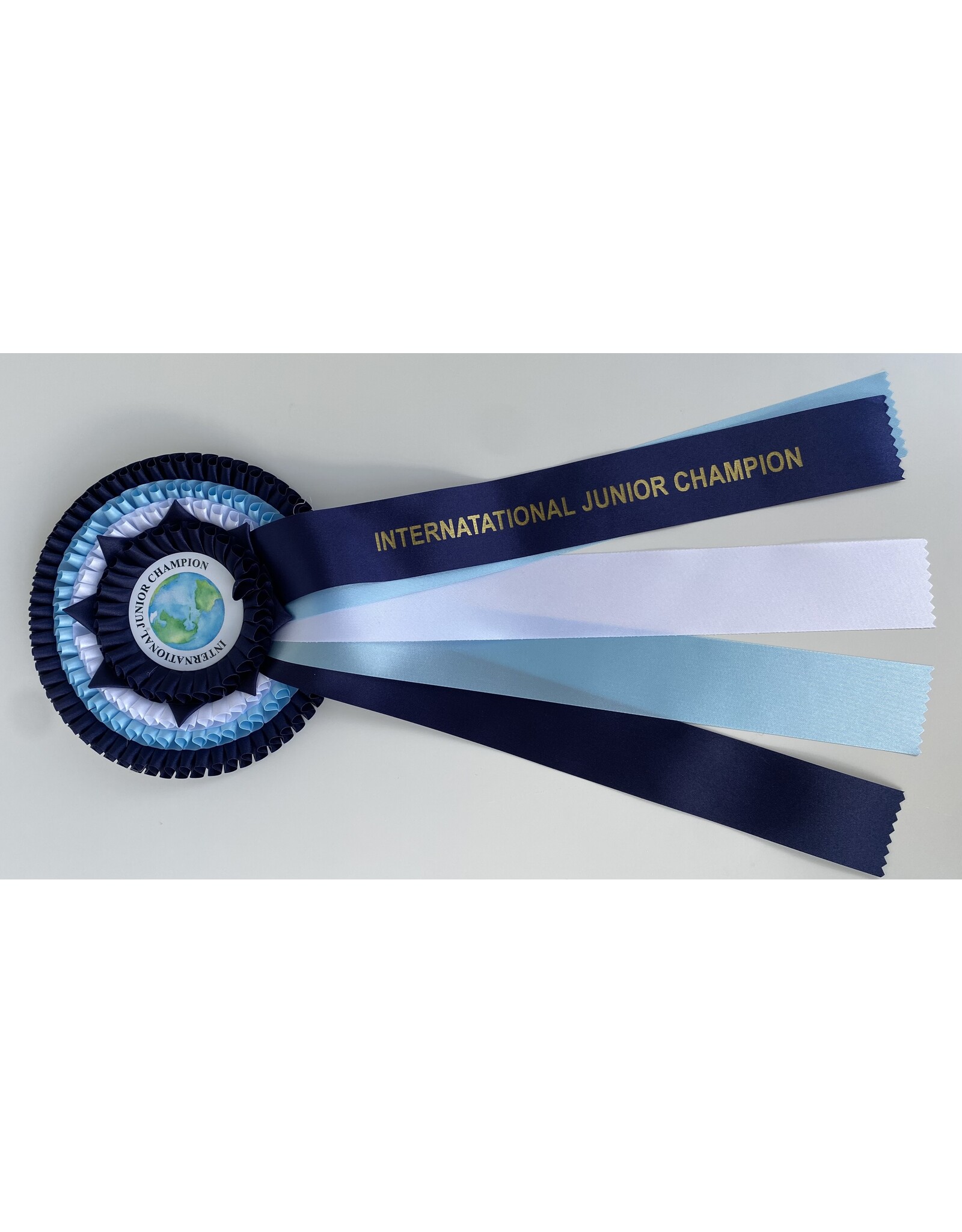 Rozet Internationaal junior champion (blauw)