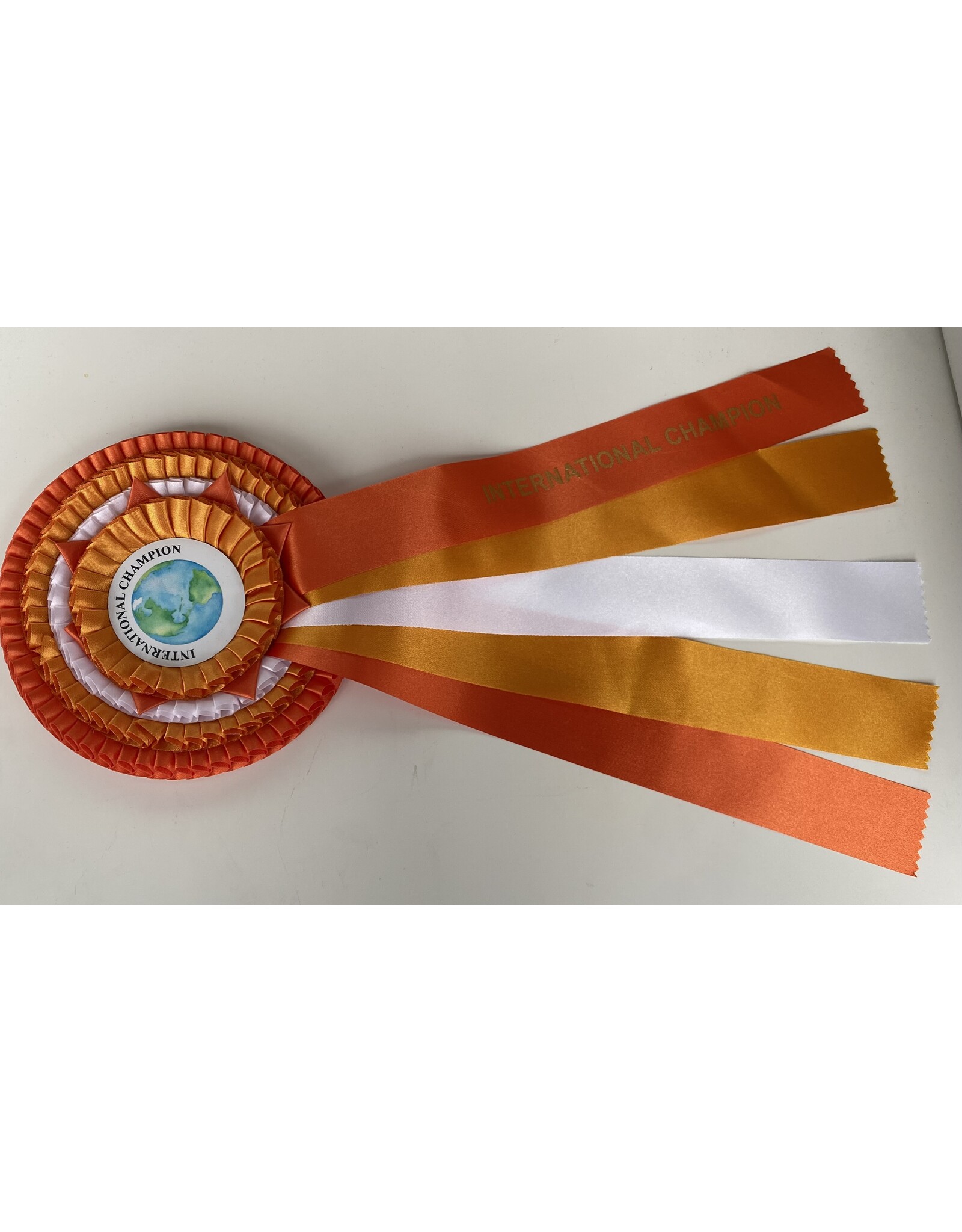 Rozet internationaal kampioen oranje