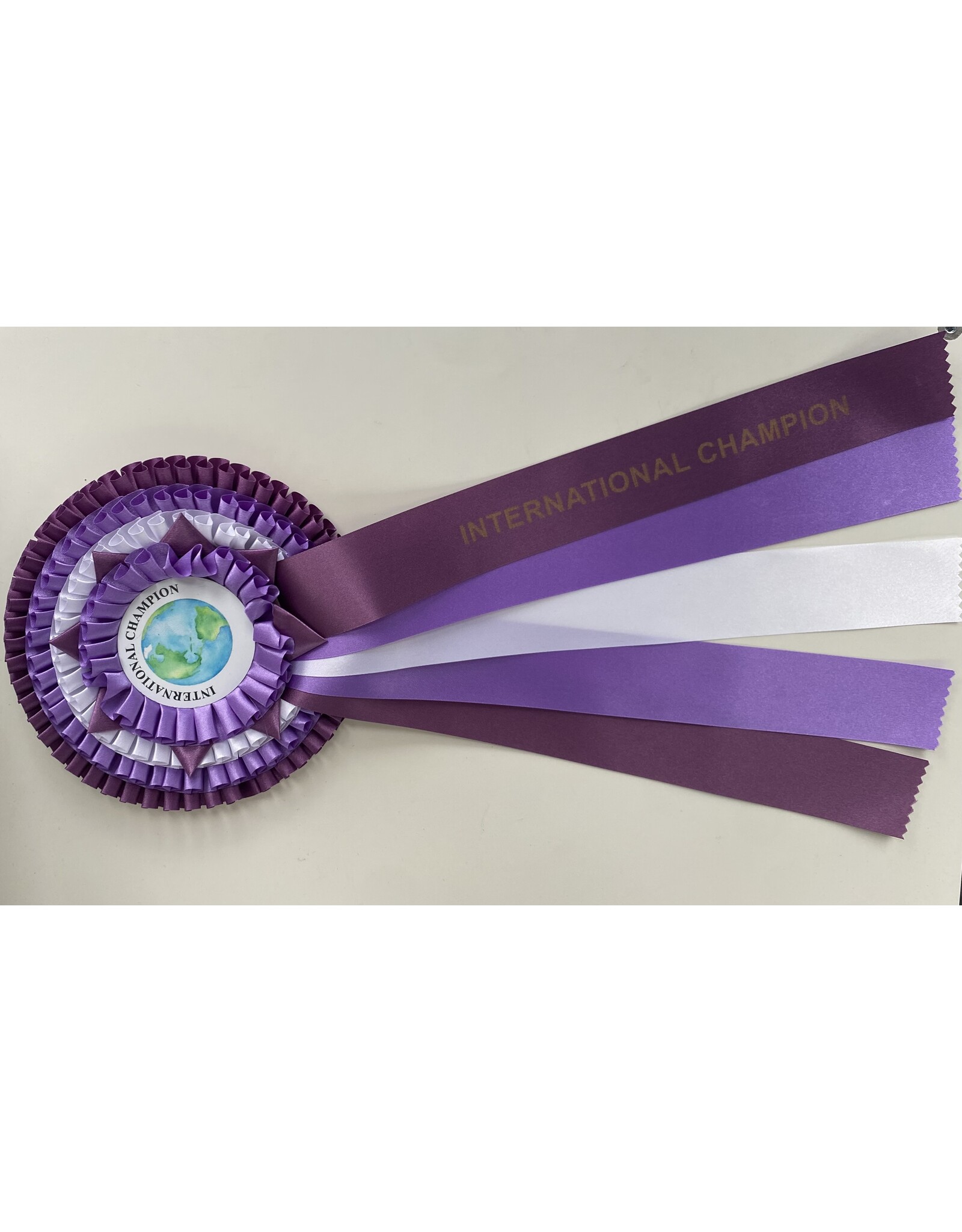 Rozet internationaal kampioen paars