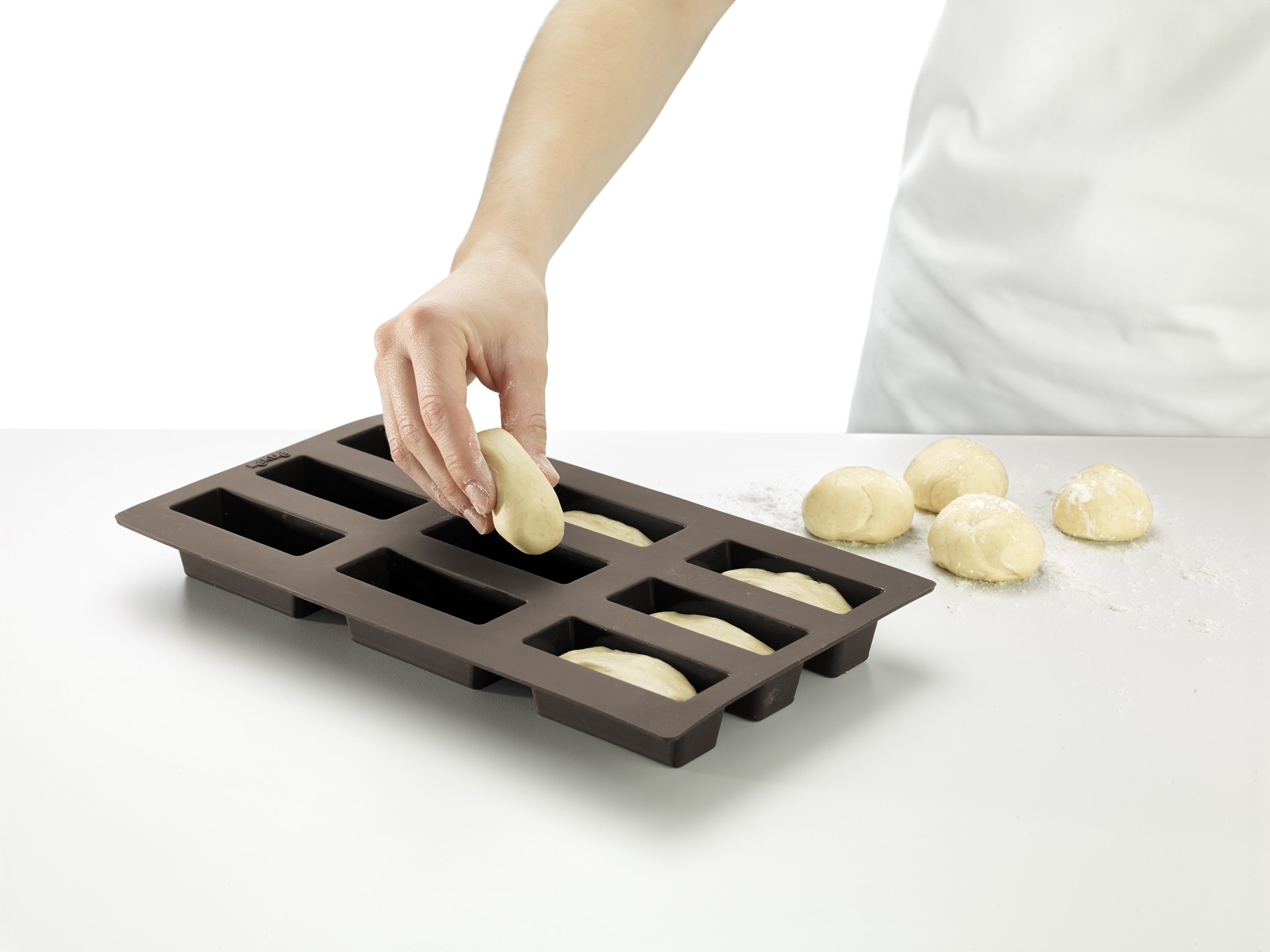 Rondsel munt wij Lékué bakvorm uit silicone voor 9 rechthoekige mini broodjes kopen? -  Broodbakshop.nl