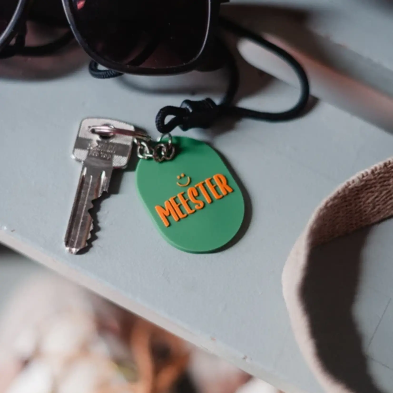 Sleutelhanger ovaal MEESTER - PVC - Groen/Oranje - 50x36mm