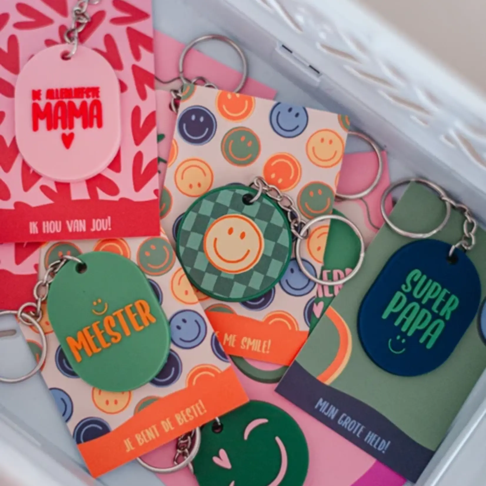 Sleutelhanger rond SMILEY - PVC - Groen/Roze - Ø40mm