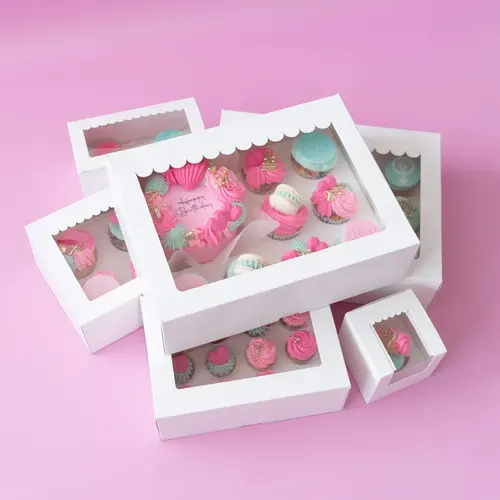 Stevige cupcakedozen, taartdozen en sweetsboxen met leuk winkelluifel venster