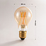Smarte E27-LED-Lampe Dim-to-Warm 7 Watt Amberglas, 60 mm (Tuya)