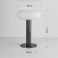 Tischlampe Zarya aufladbar mit Ladestation, integrierter LED und milchweißem Glas