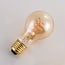 Dimmbare E27 Spiralfilamentlampe, 4,5W, 2700K, Amberglas Ø60 mm