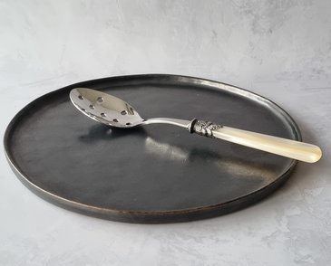 Servierlöffel mit Löchern