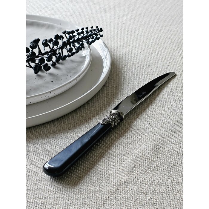 Cuchillo, Negro (nácar), Cena