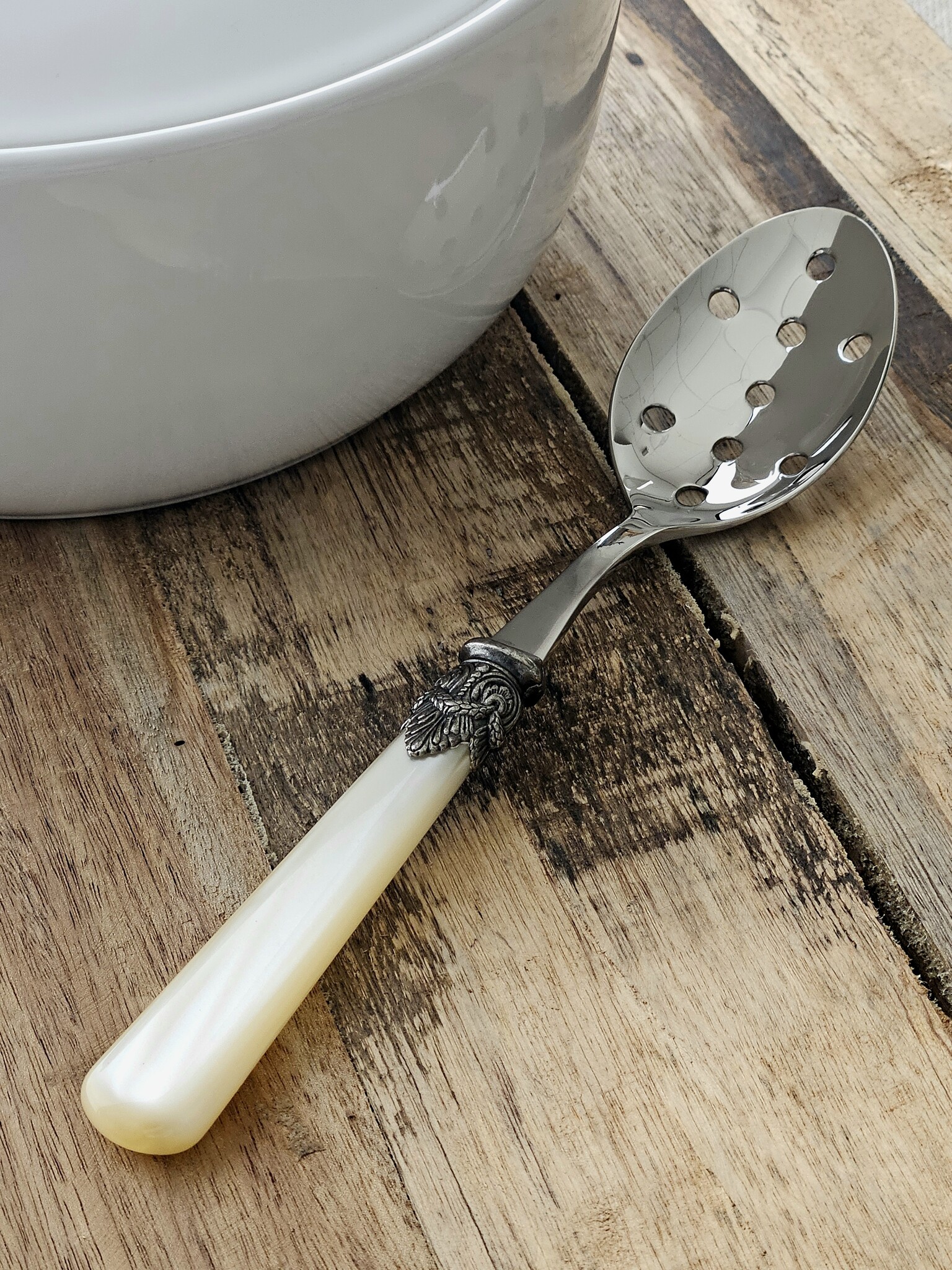 Slotted serving spoon. Ivory (mother-of-pearl sheen)
