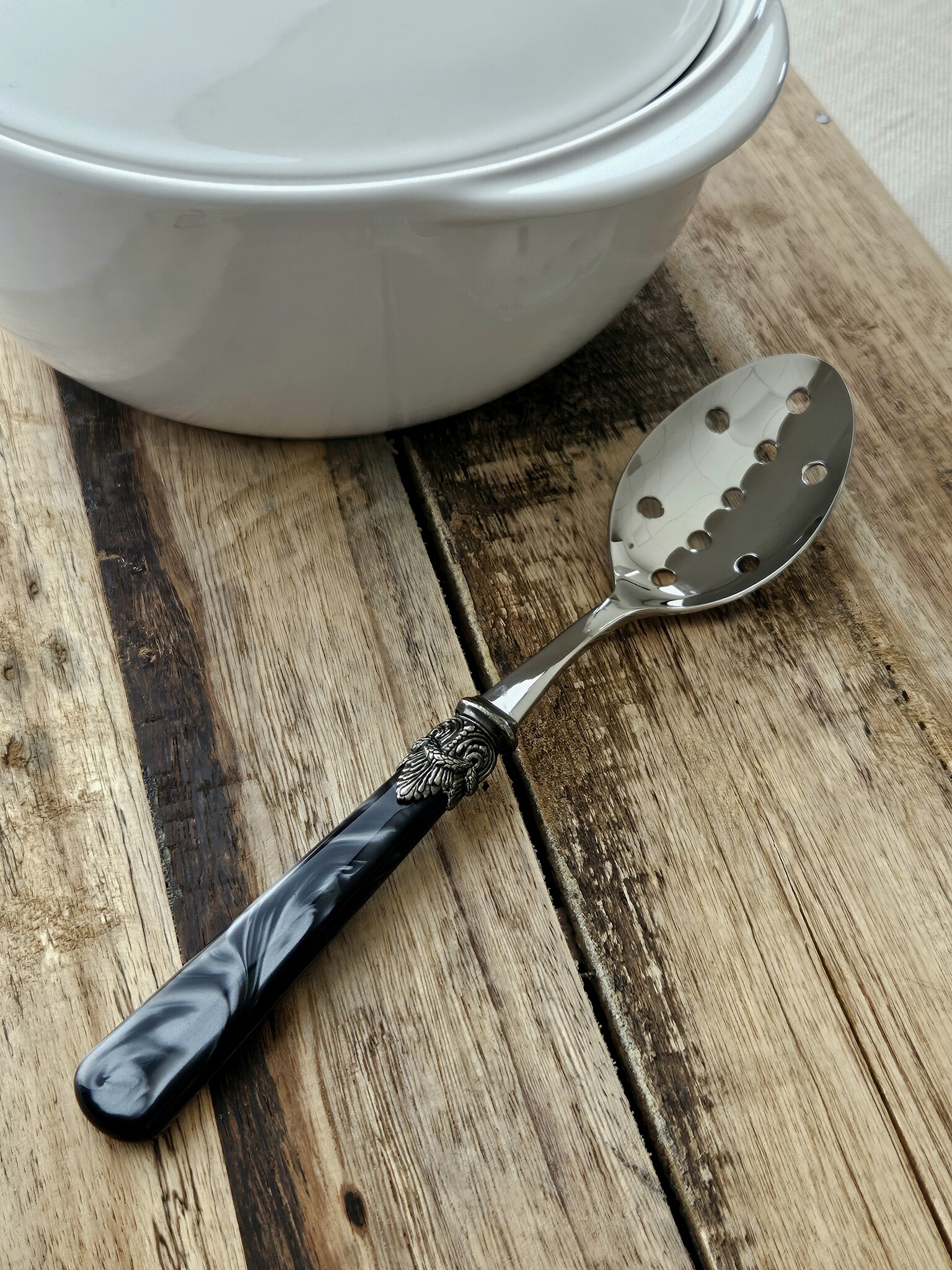 Slotted serving spoon, Black (mother-of-pearl sheen)