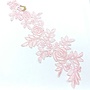 Spitzenapplikation in Rosa