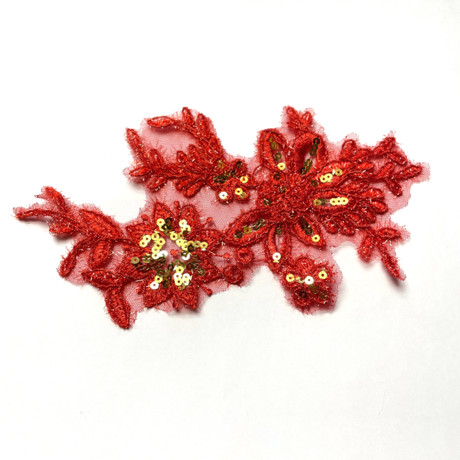 Spitzenapplikation in Rot und gold
