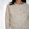 ANASTASIE gilet écru avec nœuds et perles ANASTASIE gilet écru avec nœuds et perles
