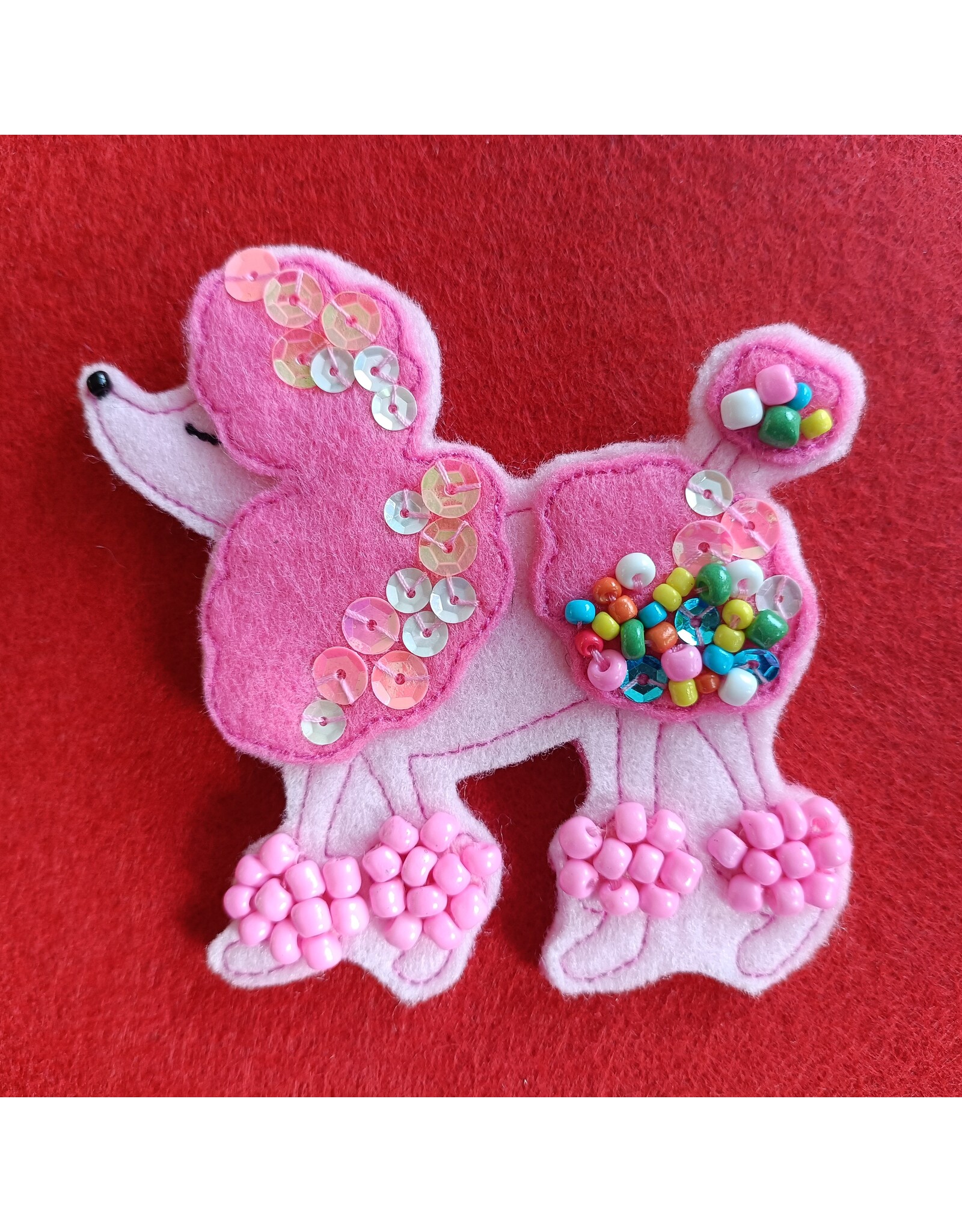 Broche Poedeloe