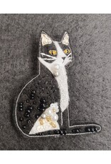 Broche Kat