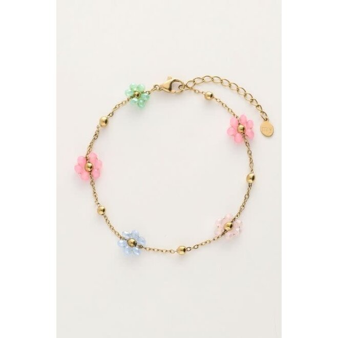Armband met bolletjes en pastel bloemen