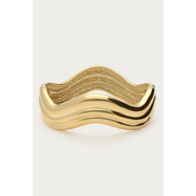 Chunky bangle met swirl goudkleurig