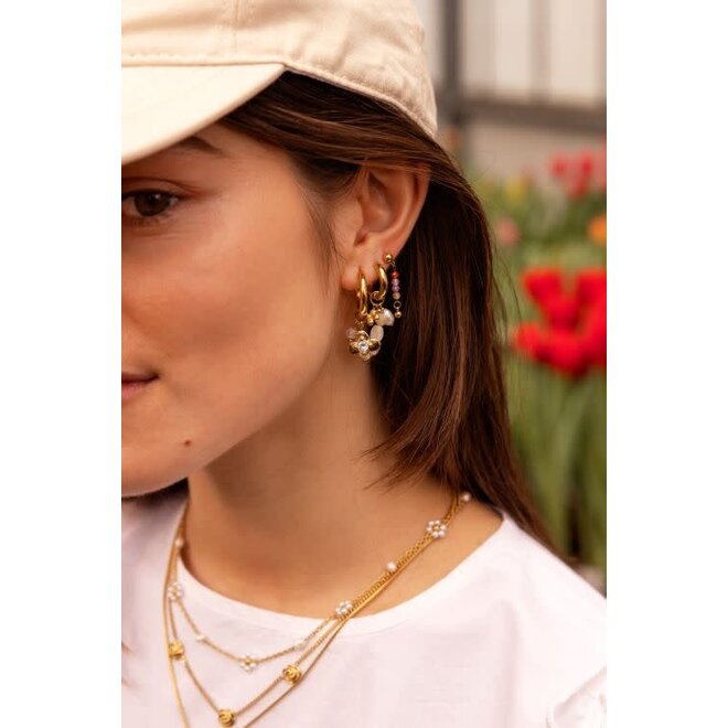 Botanical statement oorringen met bloem en strass steen