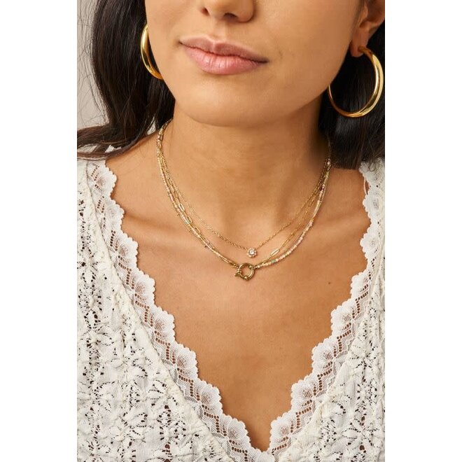 Botanical ketting met kleine beige strass bloem