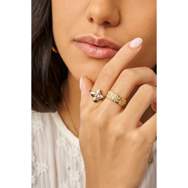 Botanical ring met bloem en roze strass steen goudkleurig