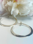 LYNSEY DE BURCA Ciorcail Large Hoop Earrings - Silver