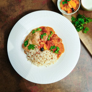 Streetfood By Han Indiaanse butter chicken met korma gamba en rijst