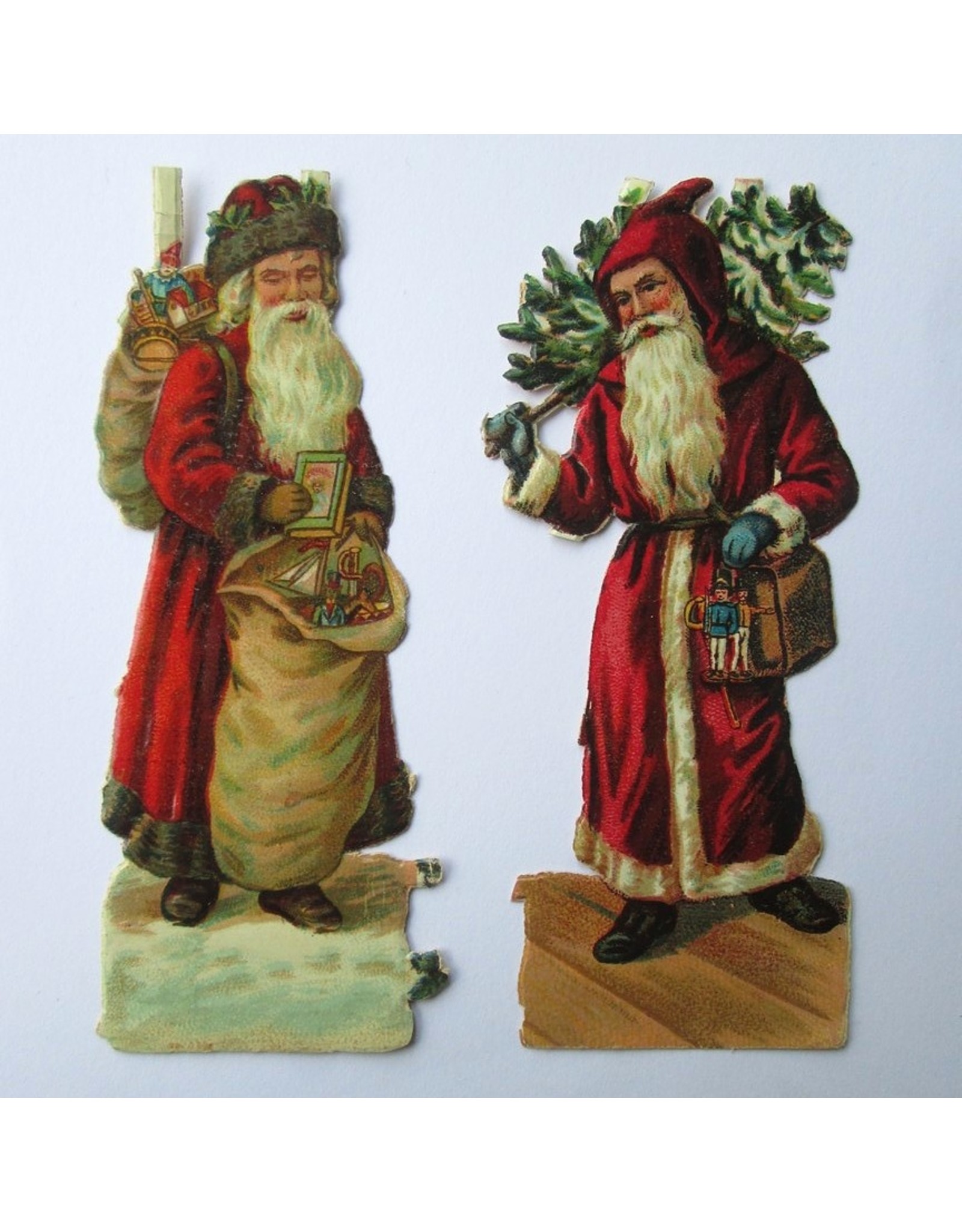 [Kerstmis]: [Poëzieplaatjes met 2 kerstmannen in chromolithografie]