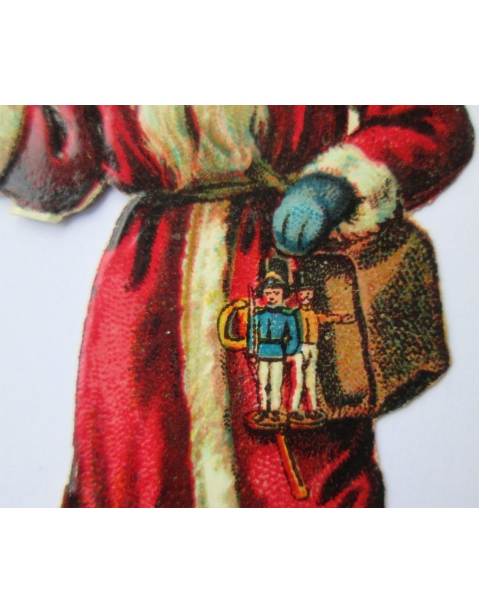 [Christmas]: [Album pictures featuring two Santa Claus figures in chromolithography]