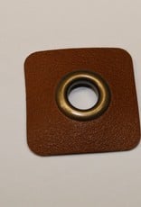 Nestelring met cognac leder