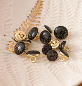 Sierknoopje zwart glitter goud in gouden capsule 11mm