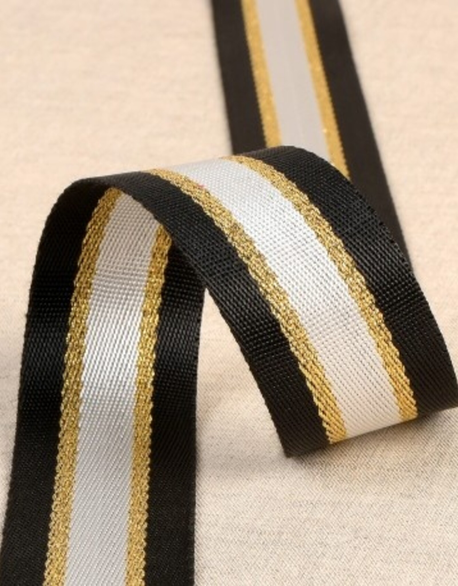 Stoffenschuur selectie Tassenband 40 mm zwart - wit -lurex goud